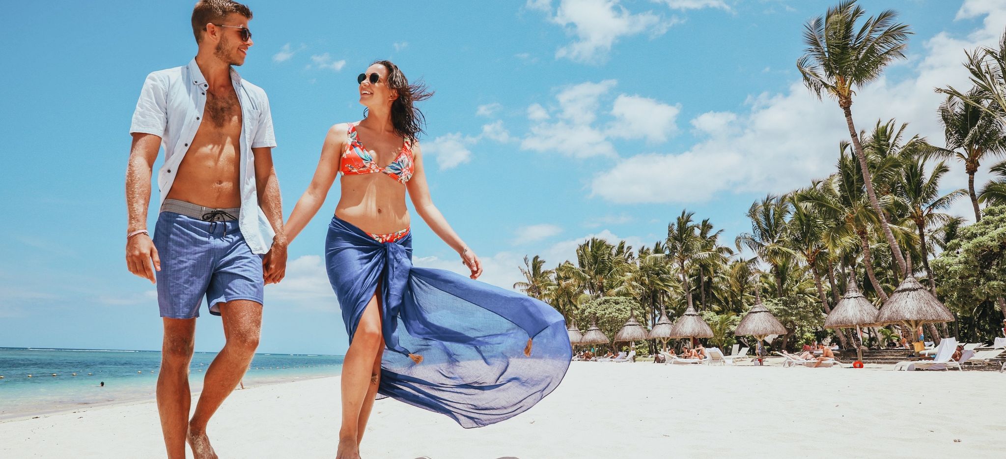 Paar am Strand des La Pirogue, Mauritius