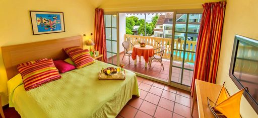 Ein Schlafzimmer im Hotel Le Nautile auf La Réunion