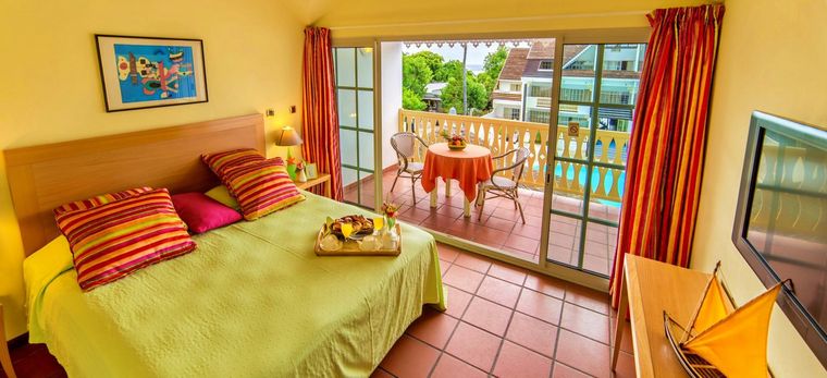 Ein Schlafzimmer im Hotel Le Nautile auf La Réunion